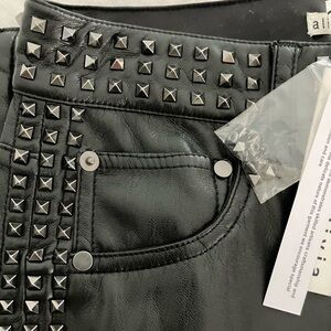 Alice + Olivia by Stacey Bendet. Faux leather black studded pants. NWT